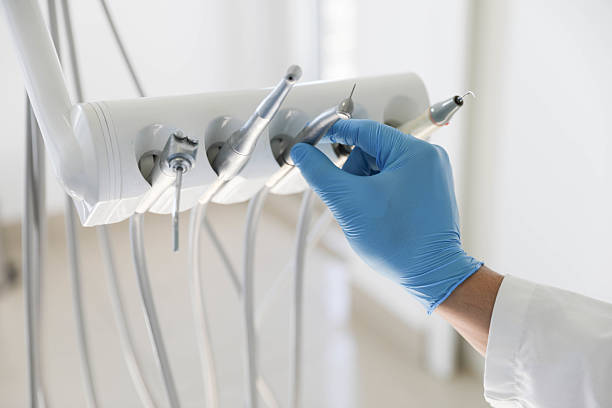 Professional Tooth Extraction technician working in Douglas, MI